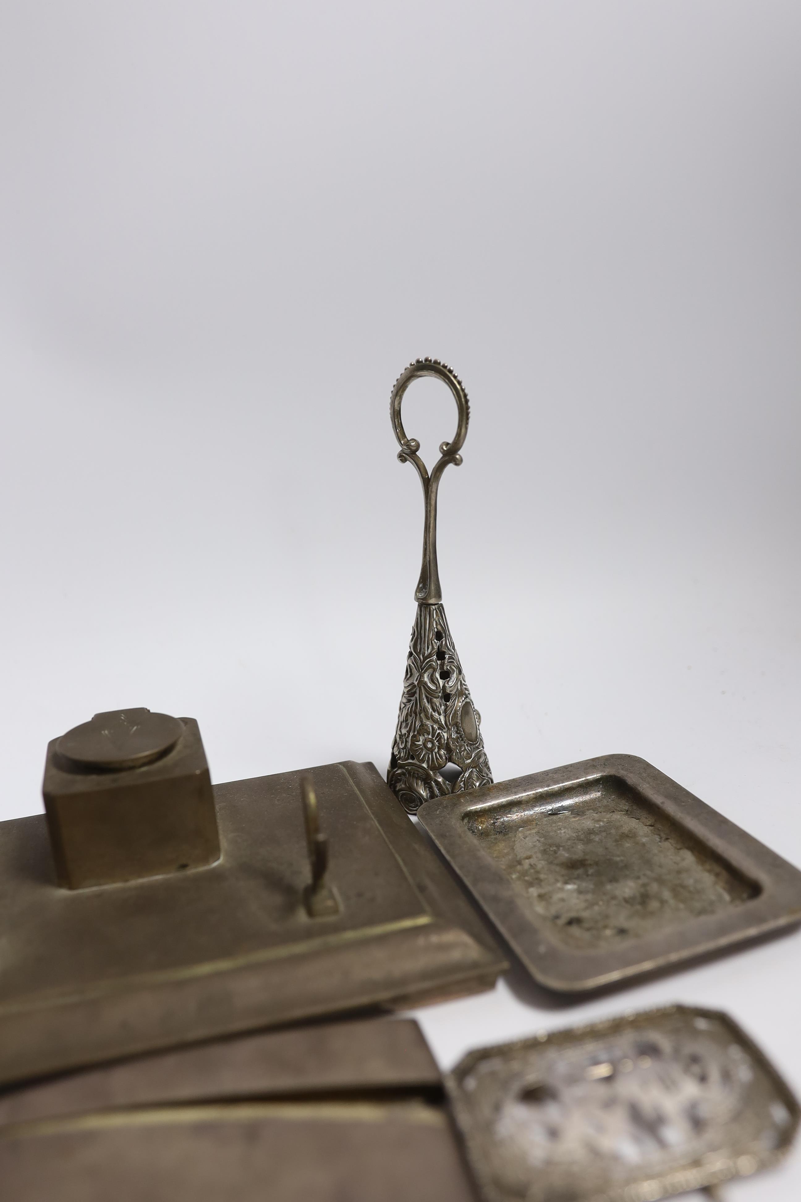 An early 20th century Chinese Export pierced white metal buckle, maker CS?, width 87mm, together with a silver plated card case, inkstand, two dishes and posy holder.